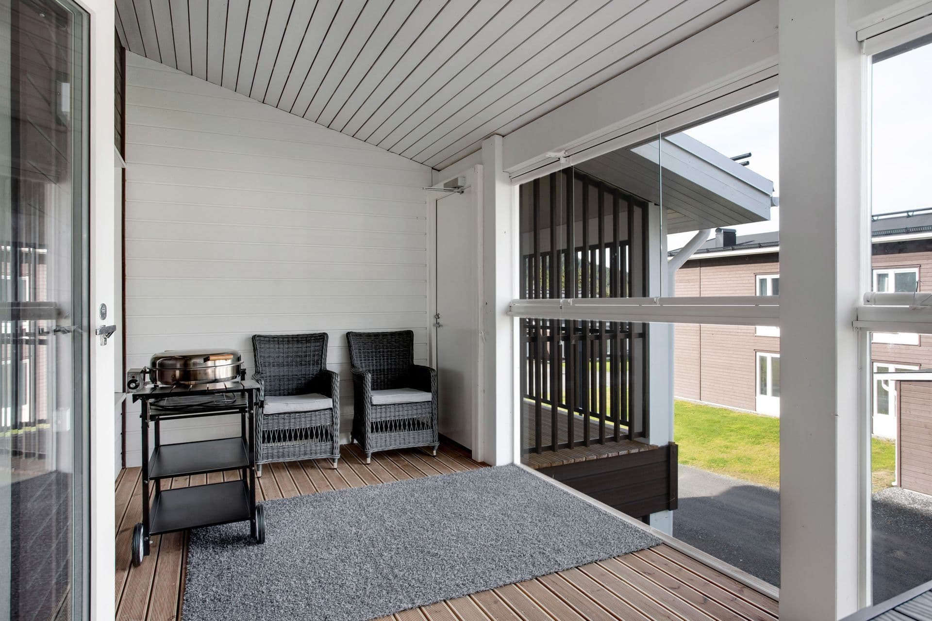 Inglasad balkong med elgrill